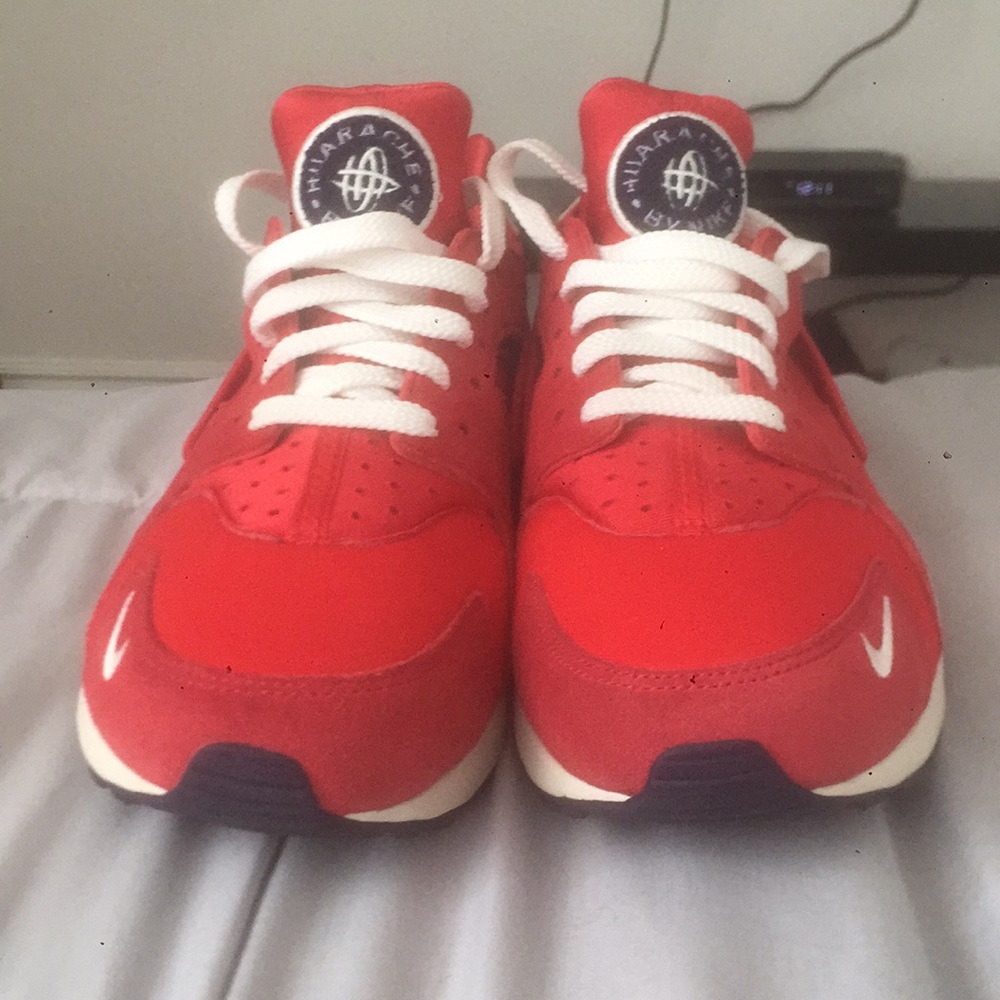 Red huaraches by Nike